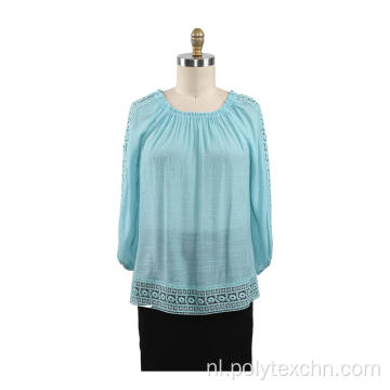 Damesblouse met 3/4 mouwen kanten afwerking